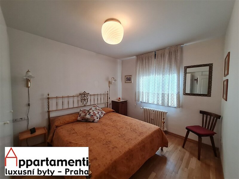 Prodej zařízeného podkrovního mezonetového bytu 3+kk, 107m2 s terasou